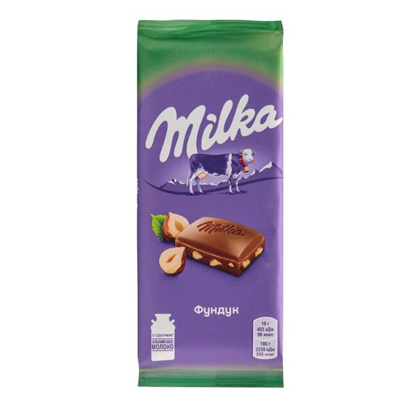 Шоколад Milka молочный с цельным фундуком