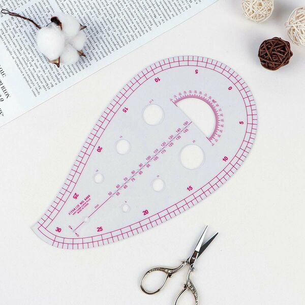 1215390 Лекало портновское метрическое капля пройма 25*13,5см прозрачный