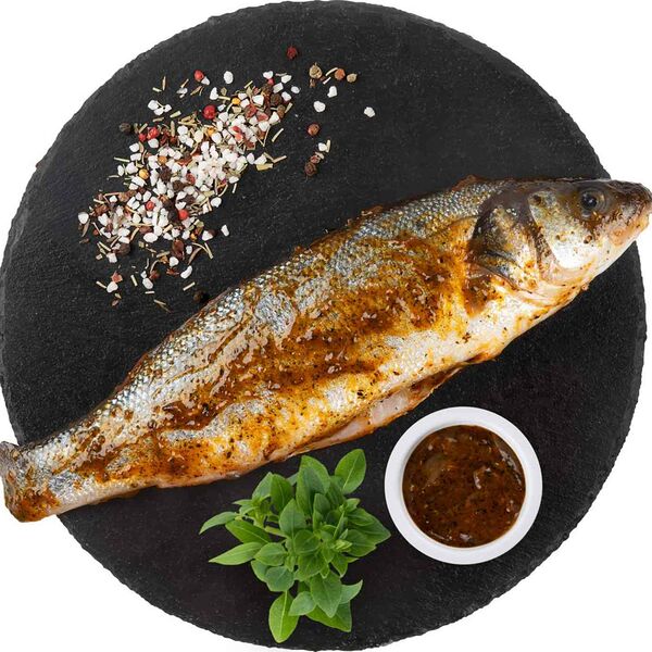 Сибас охлаждённый в маринаде Средиземноморский, потрошёный с головой