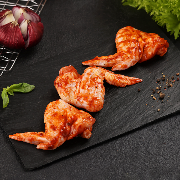 Крылья куриные в остром маринаде полуфабрикат охлажденный до 1.0кг