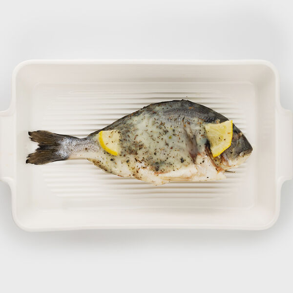 Дорада в оливковом масле с пряностями