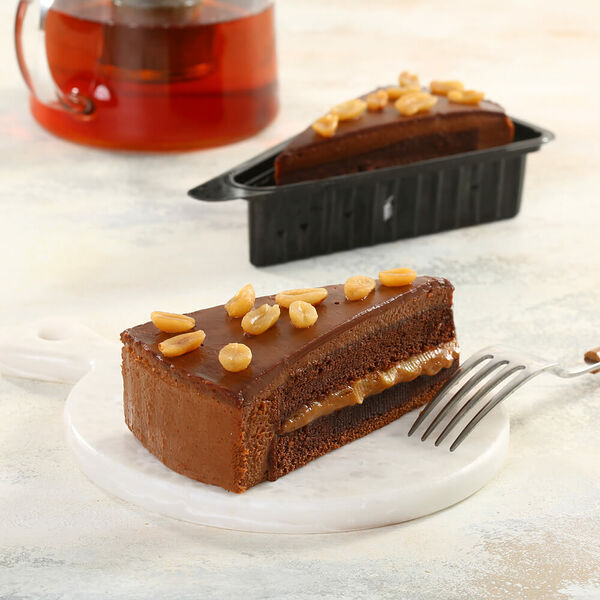 пирожное Сникки карамель-нуга-орехи МясновЪ Пекарня