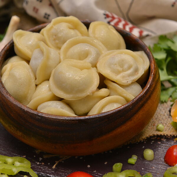 Пельмени с грибами жареные