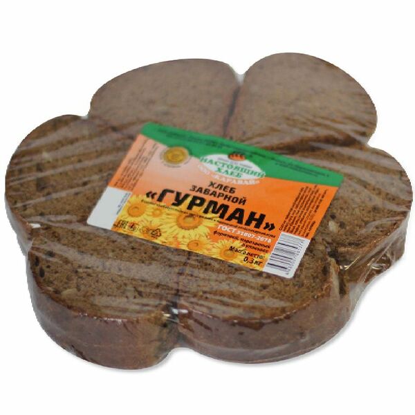 Хлеб пшенично-ржаной Каравай Гурман заварной, половинка в нарезке