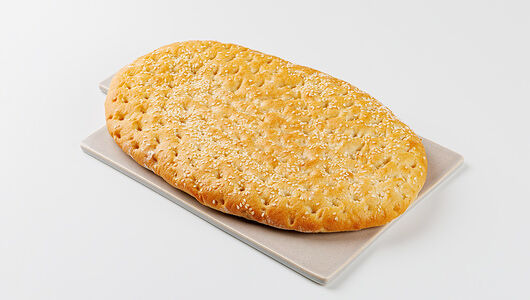 Лепешка подовая с кунжутом. Пекарня