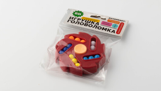 

Игрушка-головоломка с шариками
