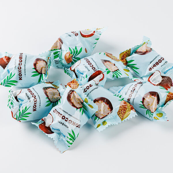 Кокосовая конфета в молочном шоколаде, вес.