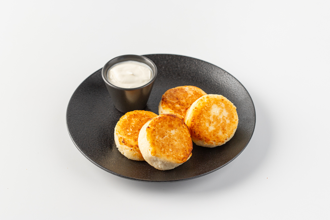 

Сырники творожные со сметаной