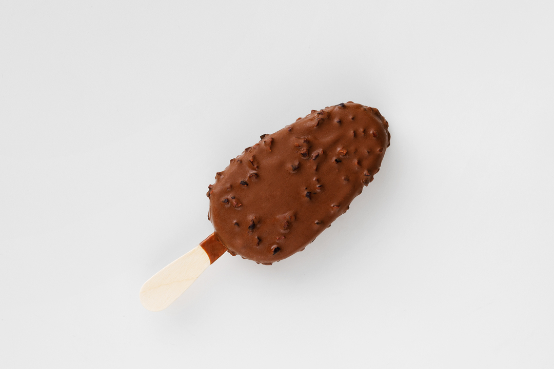 

Эскимо с обжаренными какао-бобами в молочном шок.(Продукт замороженный)