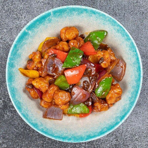 Курица с черными бобами