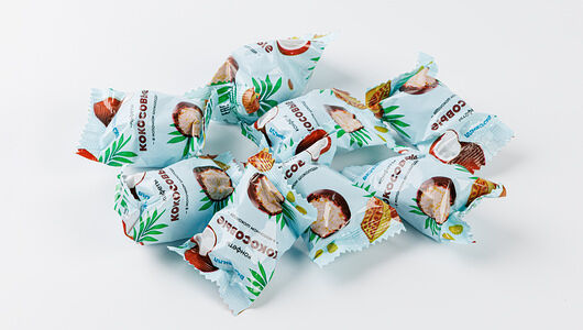 Кокосовая конфета в молочном шоколаде, вес.