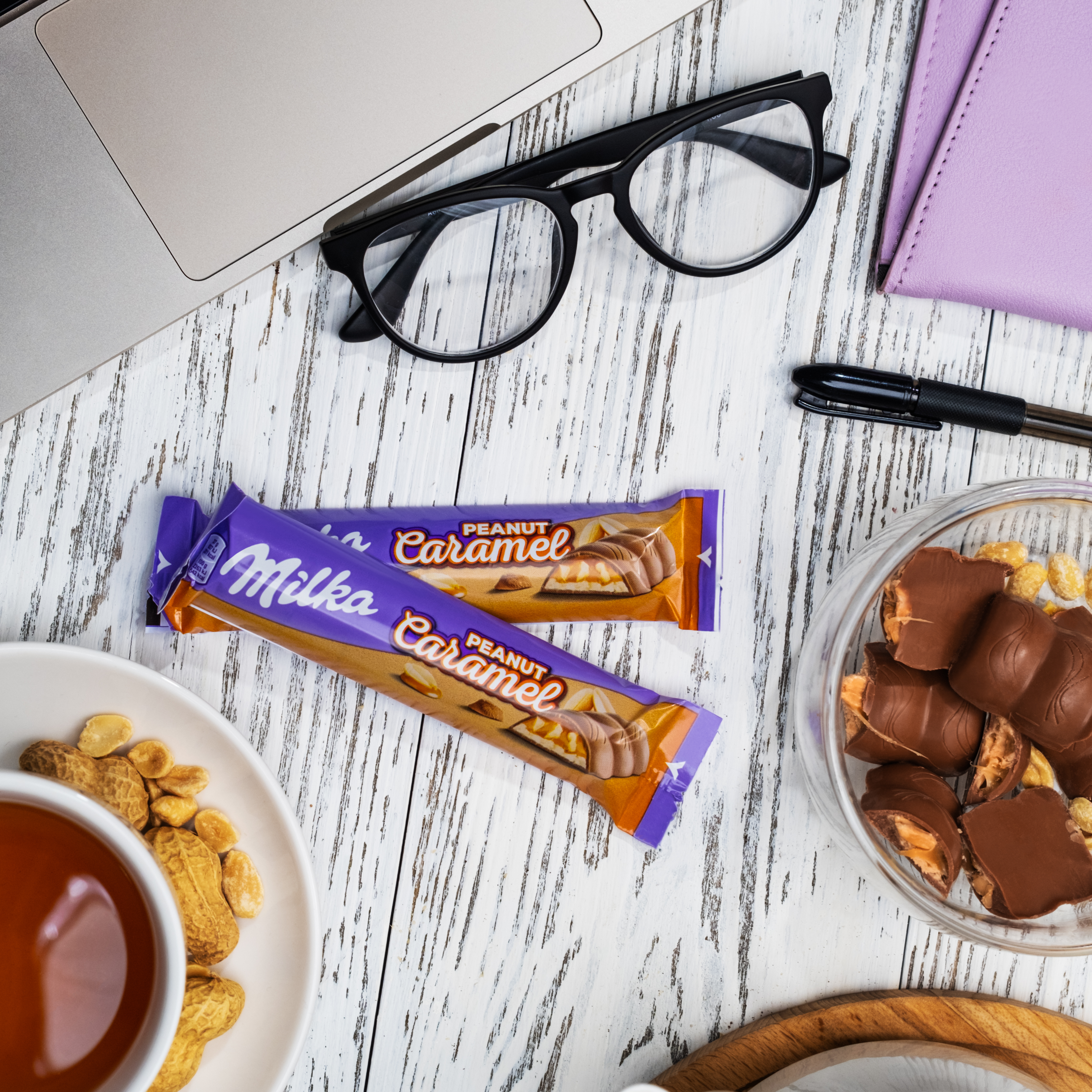 

Шоколад молочный Milka с арахисом в карамельной начинке и арахисовой начинкой с воздушным рисом и кусочками арахиса 37 г