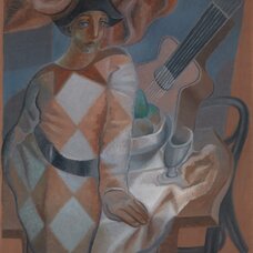 Harlequin in Front of a Table