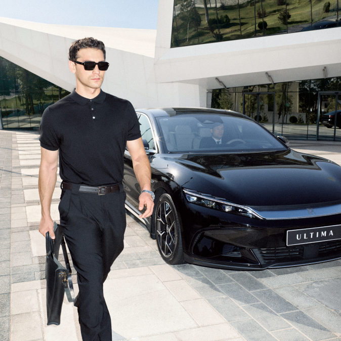 A young couple getting into a premium car