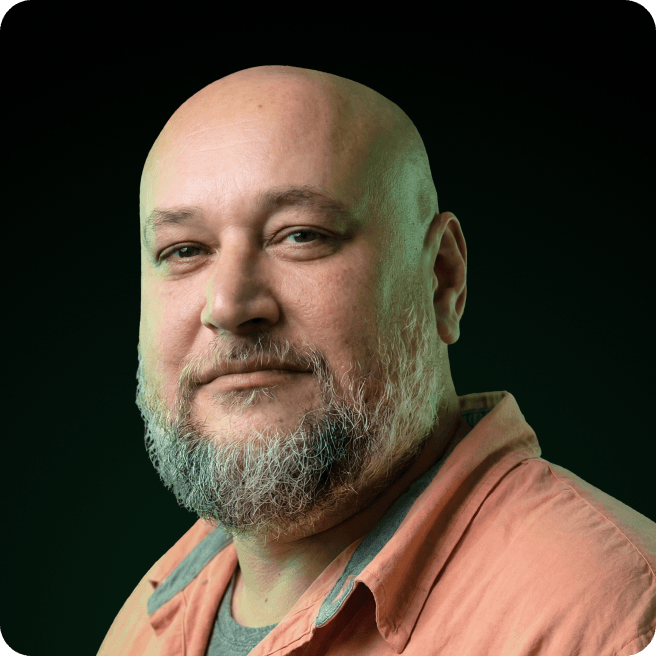 Схематичный силуэт человека на тёмном фоне: круг — голова, овал — туловище.