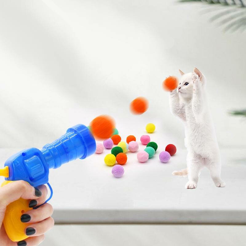 Игрушка для кошек собак и главное их хозяев. Пистолет с набором мягких шариков