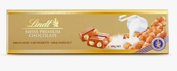 Шоколад Lindt Gold Swiss Premium Milk - Hazelnut Chocolate / Линд Премиум Молочный с цельным фундуком, 300 гр (Швейцария) - фотография № 1