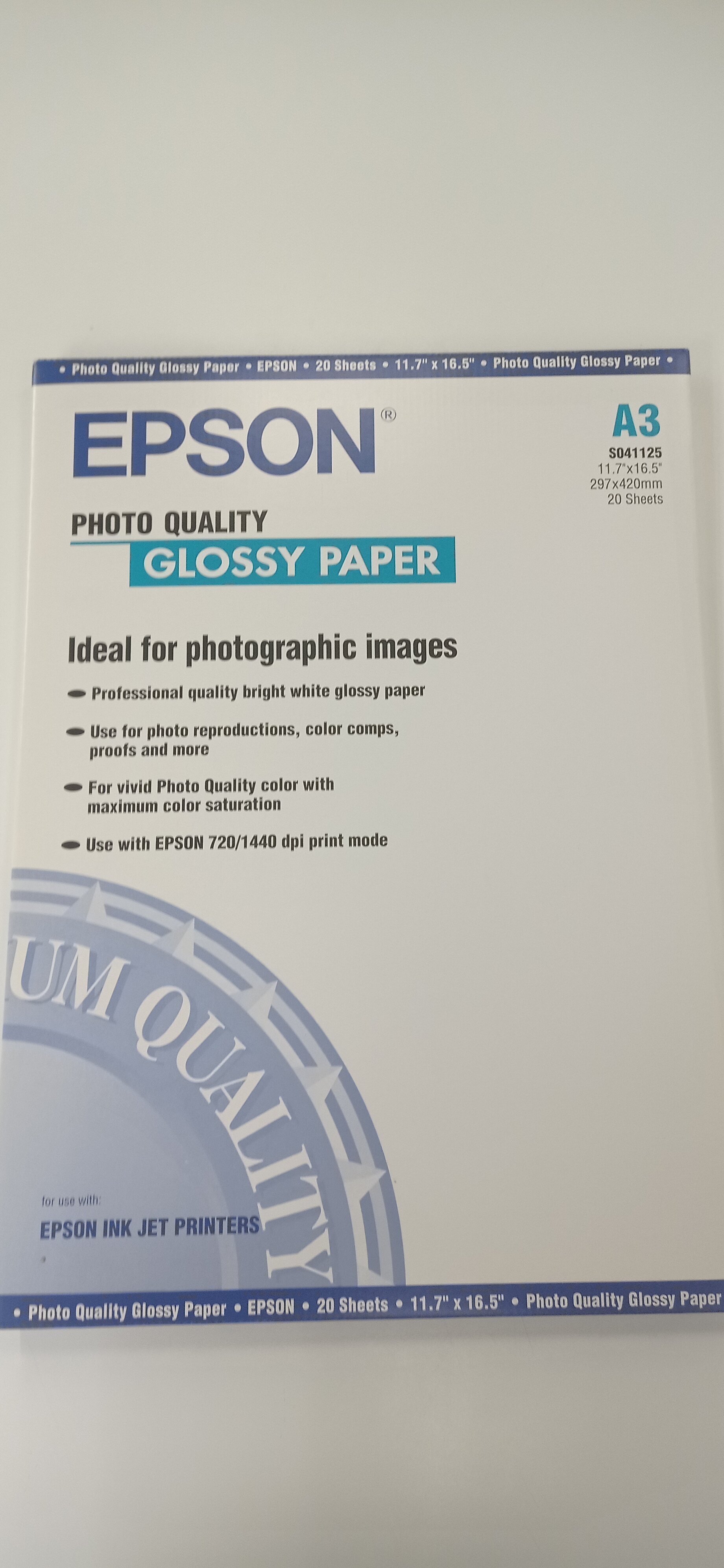 Бумага Epson C13S041125 (Photo Quality Glossy Paper) глянцевая. Формат А3, плотность 147 г/м2, в пачке 20 листов.