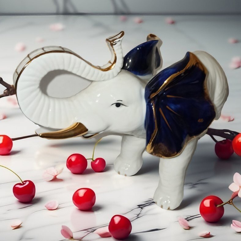 фото Фарфоровый слон 25x18x10 см, 900 г