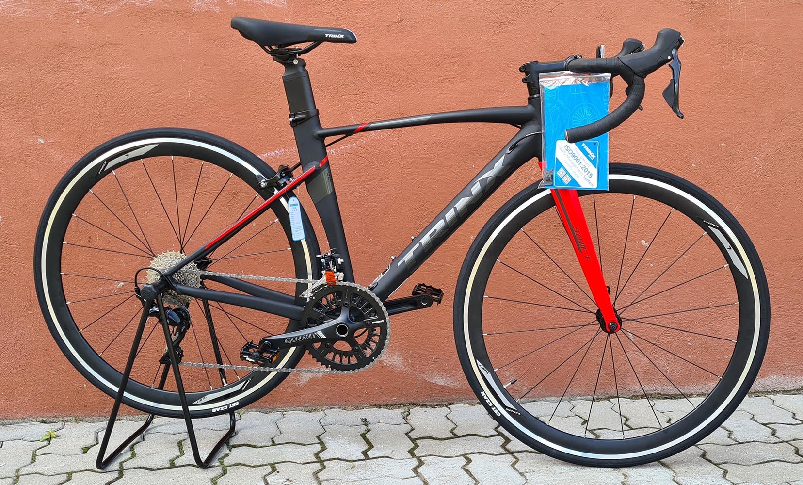 Велосипед TRINX Шоссейный велосипед TRINX SWIFT 2.0 (540 мм Matt black grey red)