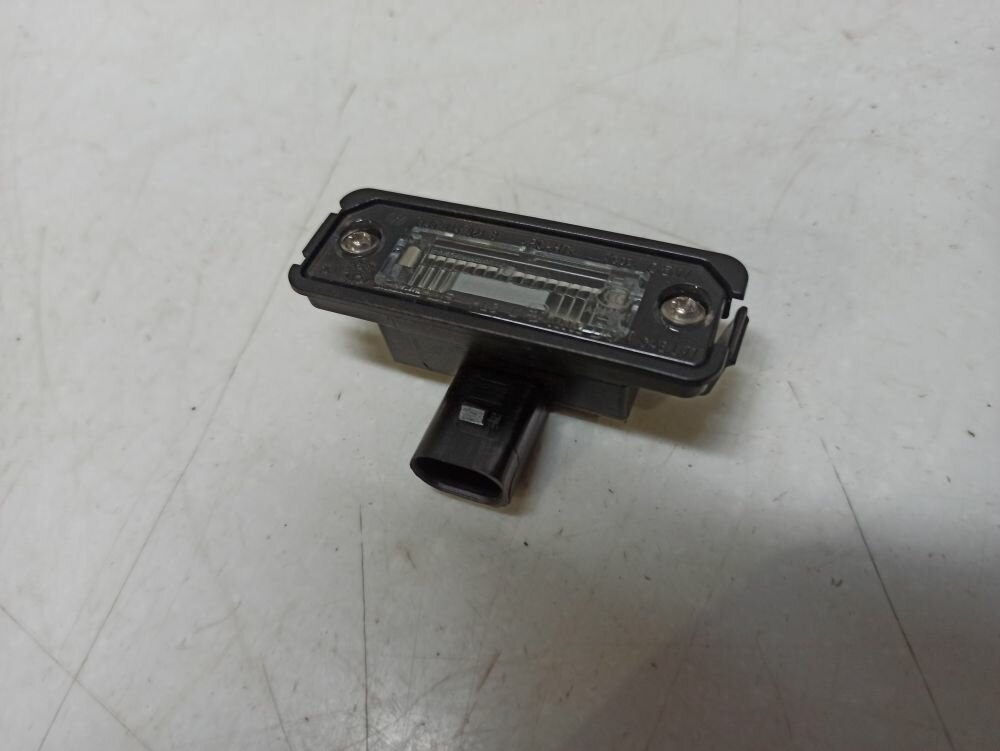 фото Фонарь подсветки номера VAG Passat Golf Skoda Seat