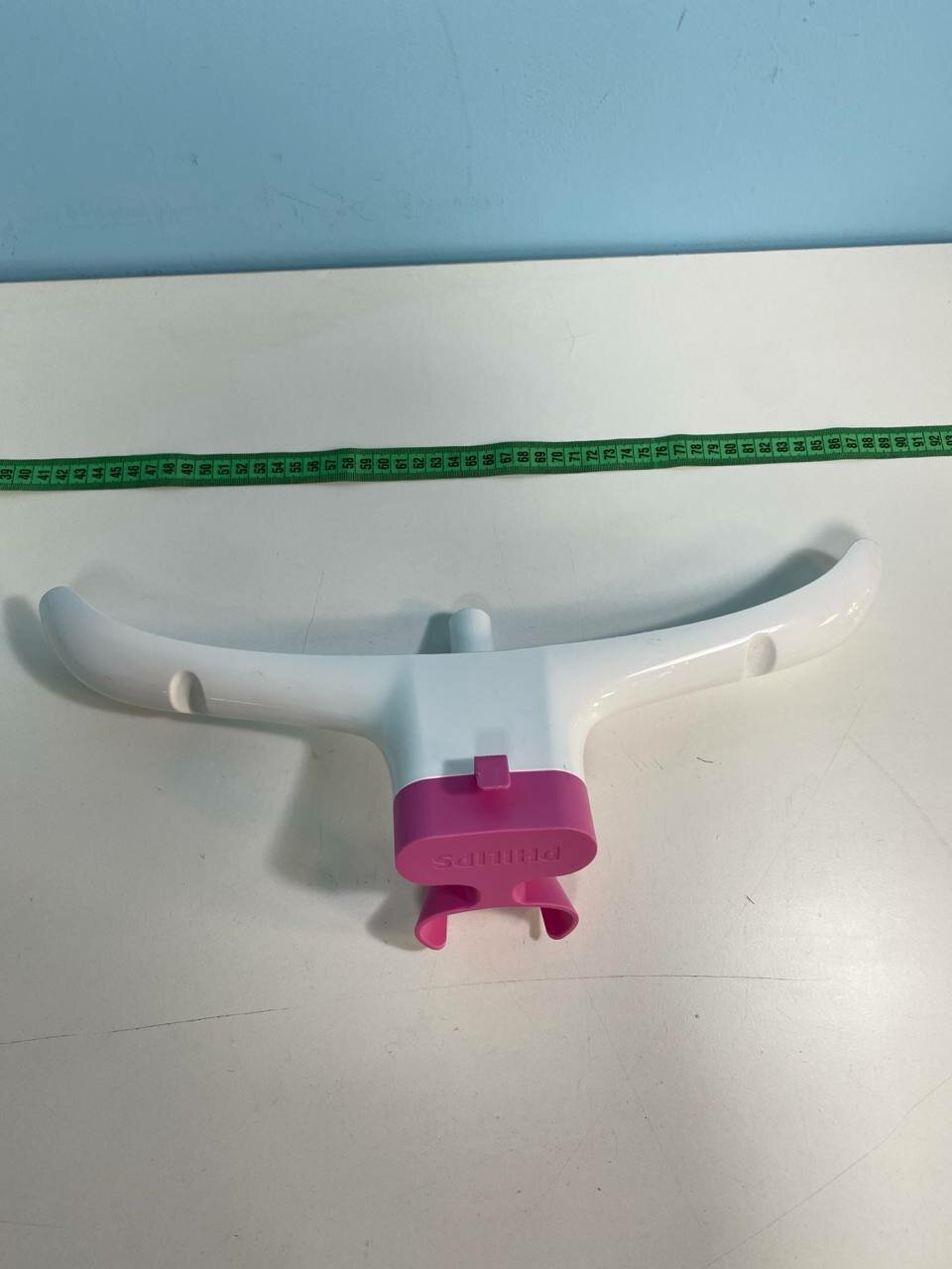 фото Держатель телескопической стойки для вертикального отпаривателя Philips