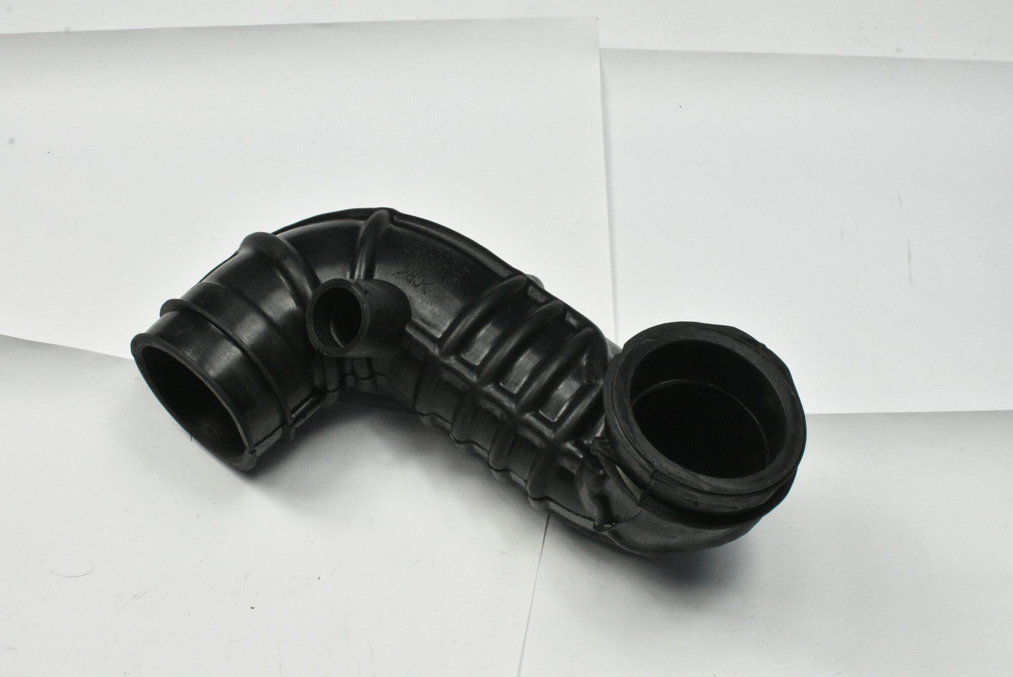 фото Патрубок воздушный Toyota Platz, Vitz, Ist, xB, Funcargo 1NZFE