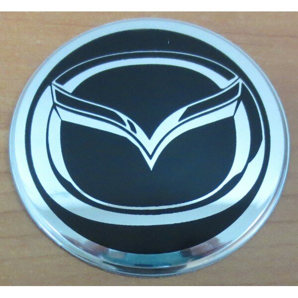 Наклейка Mazda (диаметр 70мм.) на автомобильные колпаки диски компл. 4шт. (5270)