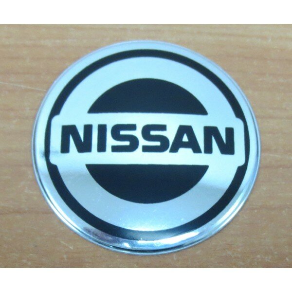 Наклейка Nissan (диаметр 60мм.) на автомобильные колпаки диски компл. 4шт. (5293)