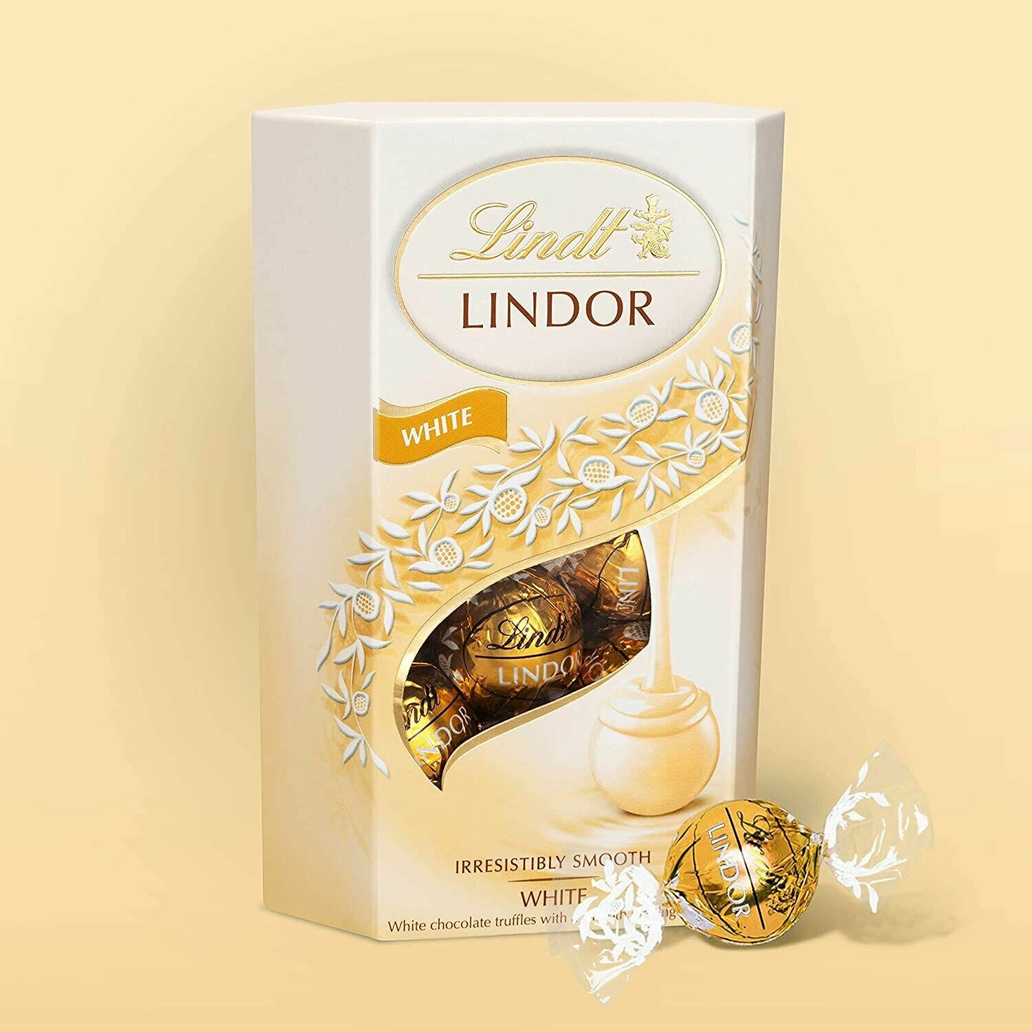 Трюфели из белого шоколада Lindt Lindor 200гр х 4шт - фотография № 2