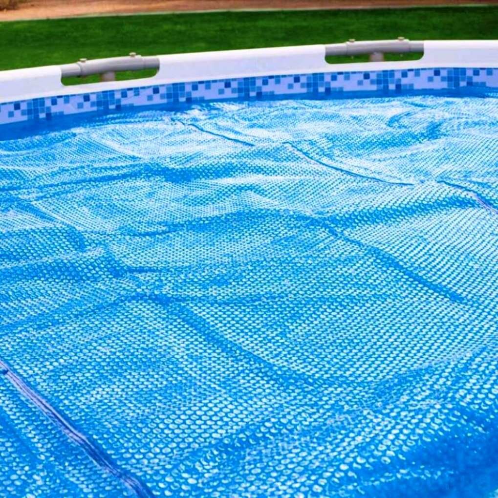 Покрывало для бассейнов Intex Solar Pool Cover 549х274 см 28016 - фотография № 6