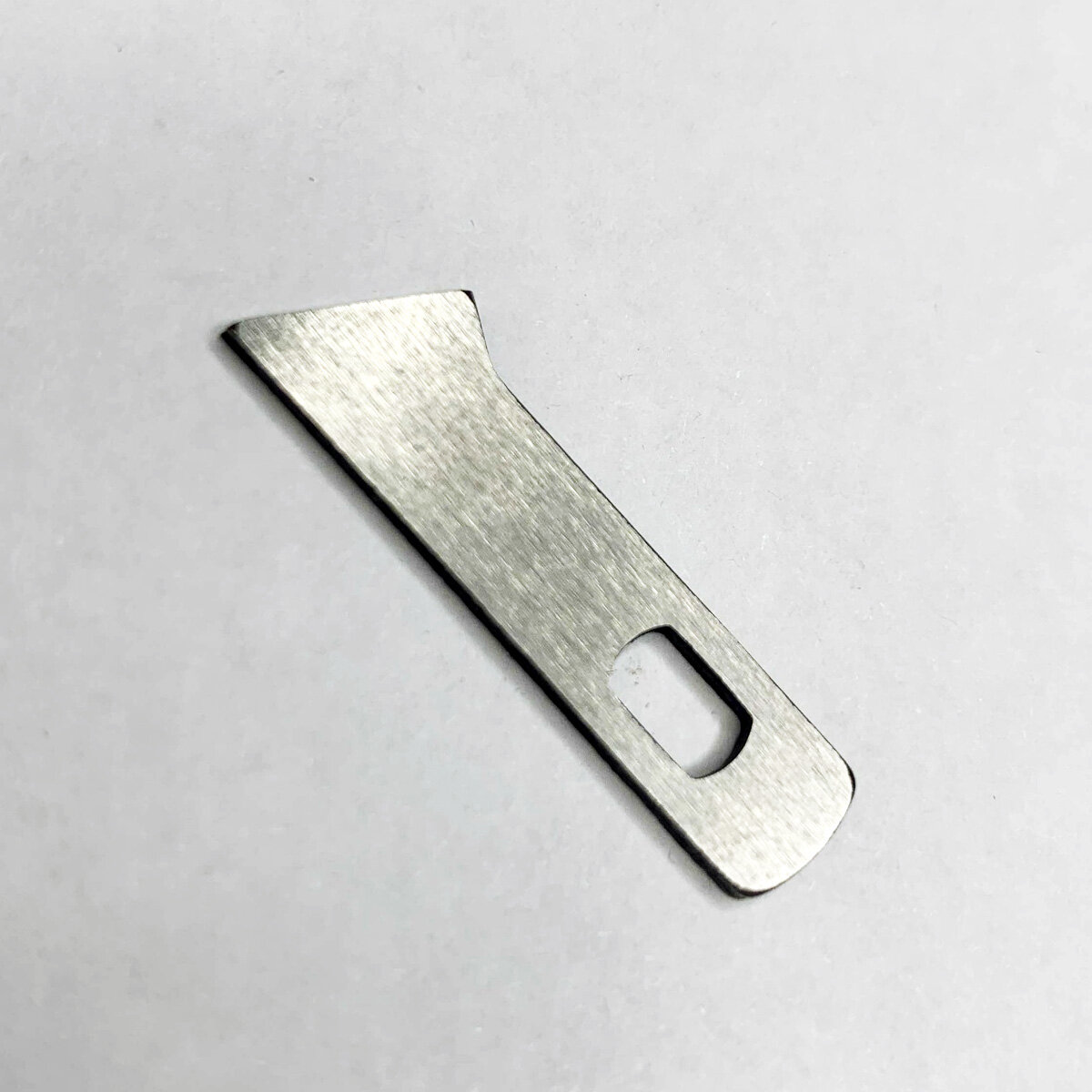 фото Merrylock Нижний нож для 005, 013 и других моделей