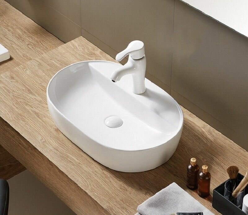 Раковина для ванной, CeramaLux D1346, накладная, овальная, с антигрязевым покрытием, с отверстием под смеситель. Гарантия 10 лет.