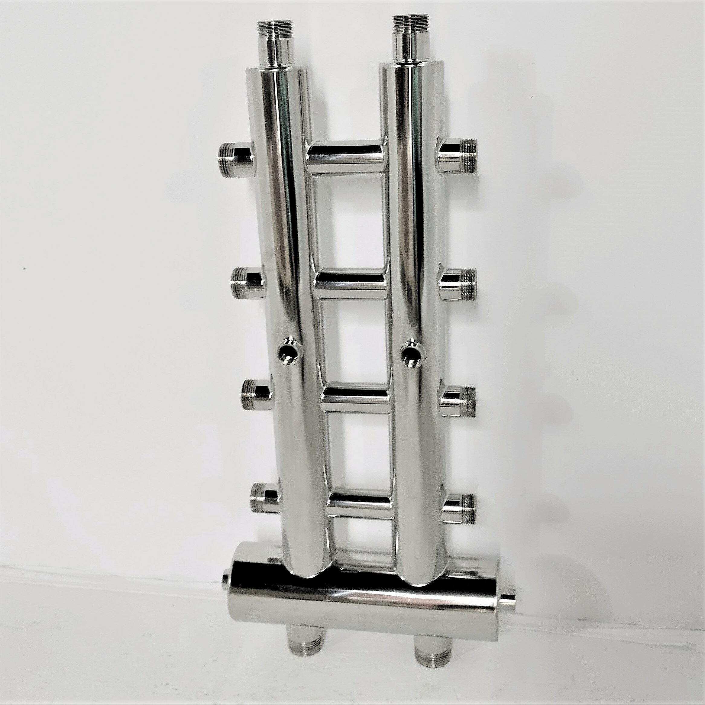 фото Гидрострелка GSK32-5 с коллектором - гидравлический разделитель. 60 кВт., 5 контуров.