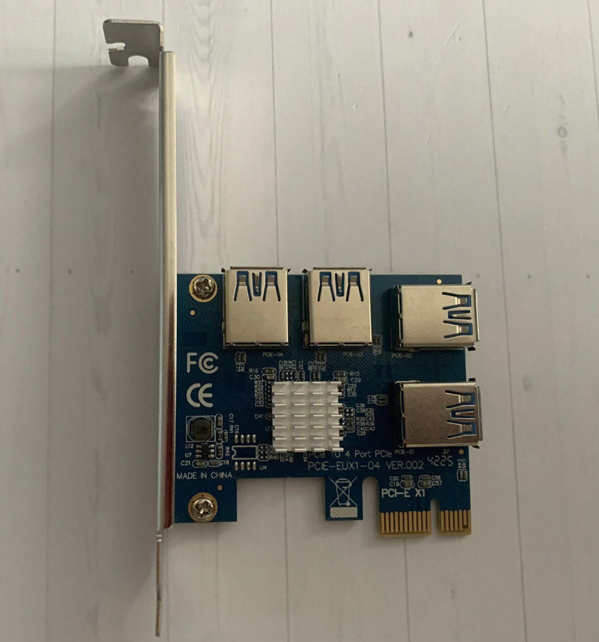 Расширитель с одного PCI-E на 4 райзера
