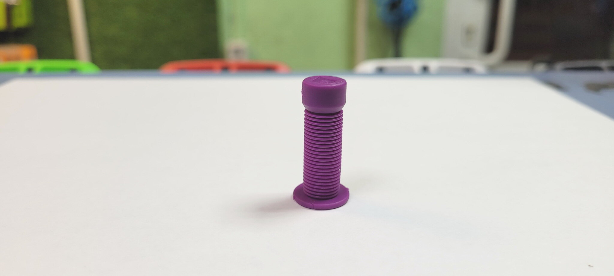 Колпачок на ниппель в форме грипсы ODI Longneck, Schrader, фиолетовый