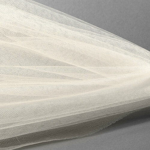 Фатин Кристалл средней жесткости блестящий арт. K. TRM шир.300см, 100% полиэстер цв. 04 К уп.5м - молочный