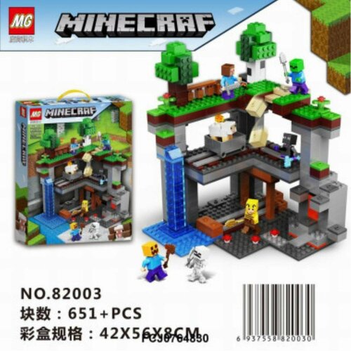 Конструктор MG 82003 Майнкрафт Первое приключение 651 дет. 56x42x8 конструктор lego minecraft 21169 первое приключение 542 дет