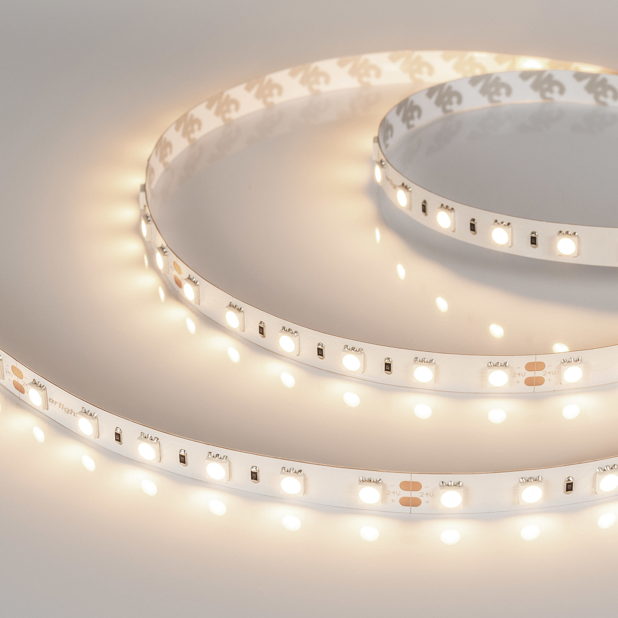 Светодиодная лента Arlight 14,4W/m 60LED/m 5060SMD теплый белый 5M - фото №7
