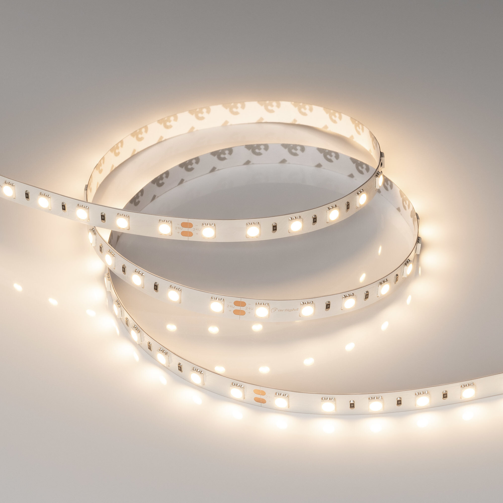 Светодиодная лента Arlight 14,4W/m 60LED/m 5060SMD теплый белый 5M - фото №5