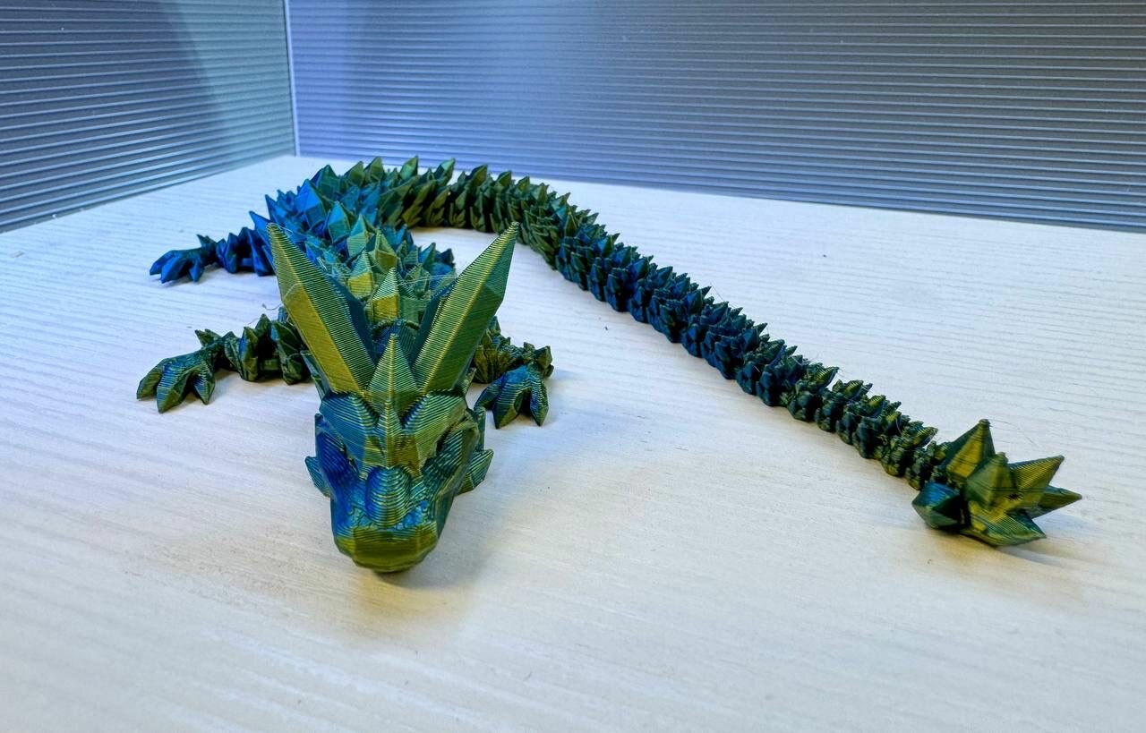 Подвижный дракон 34 см зелено-синий-желтый