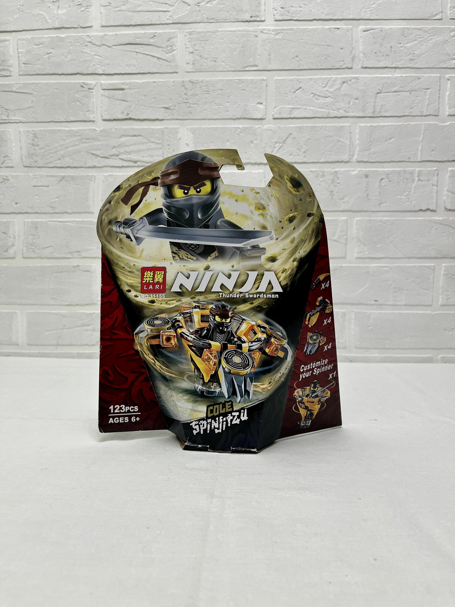 Конструктор LARI NINJA 11155 Бой мастеров кружитцу - Коул, 123 детали