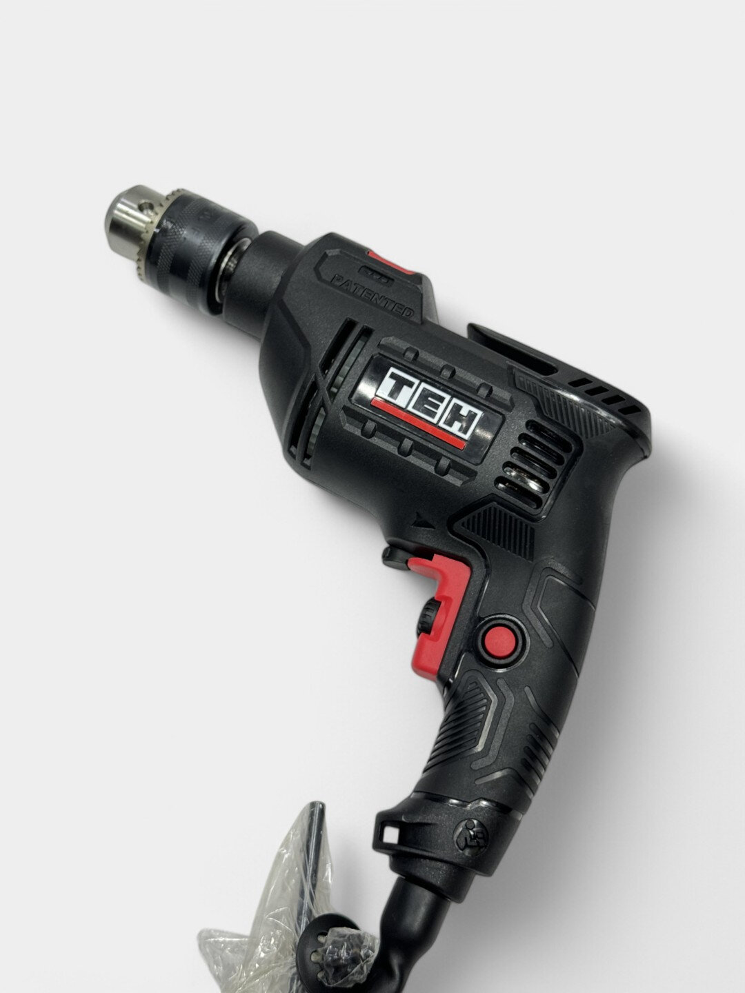 Ударная дрель TEH TD1307A, 710 Вт, 3000 об/мин, 48000 уд/мин — фото 1