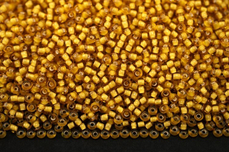 Бисер чешский PRECIOSA круглый 10/0 15056 янтарный прозрачный, белая линия внутри, 1 сорт, 50г