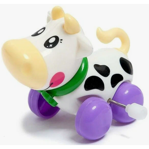 Заводная корова с бантиком заводной механизм для детей и малышей от 0 лет 317₽