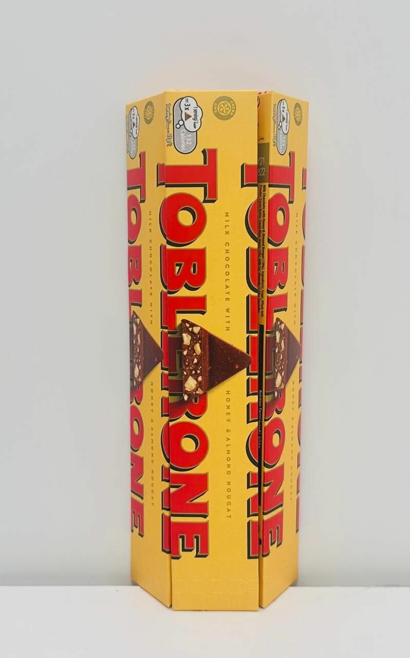 Шоколад молочный Toblerone с медово-миндальной нугой, 5 штук по 100 г