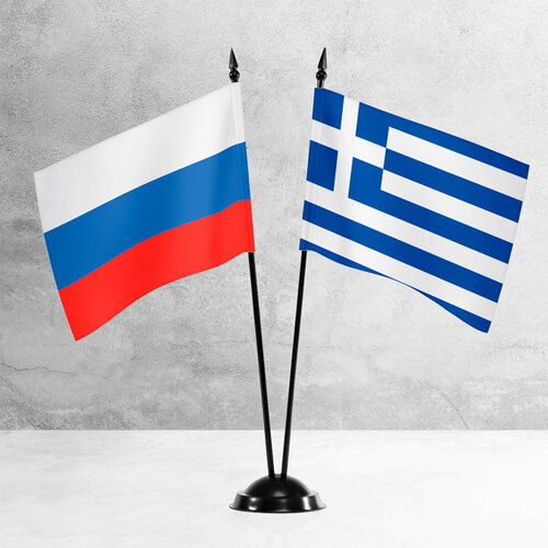Настольные флаги России и Греции на пластиковой черной подставке настольные флаги россии и тулы на пластиковой черной подставке