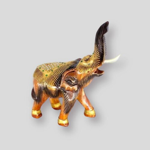 Статуэтка. Слон с инкрустацией . Материал: дерево Манкивуд Размер: 25х10х34 см.