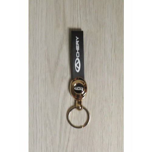 Брелок, гладкая фактура, Chery, черный/золотистый