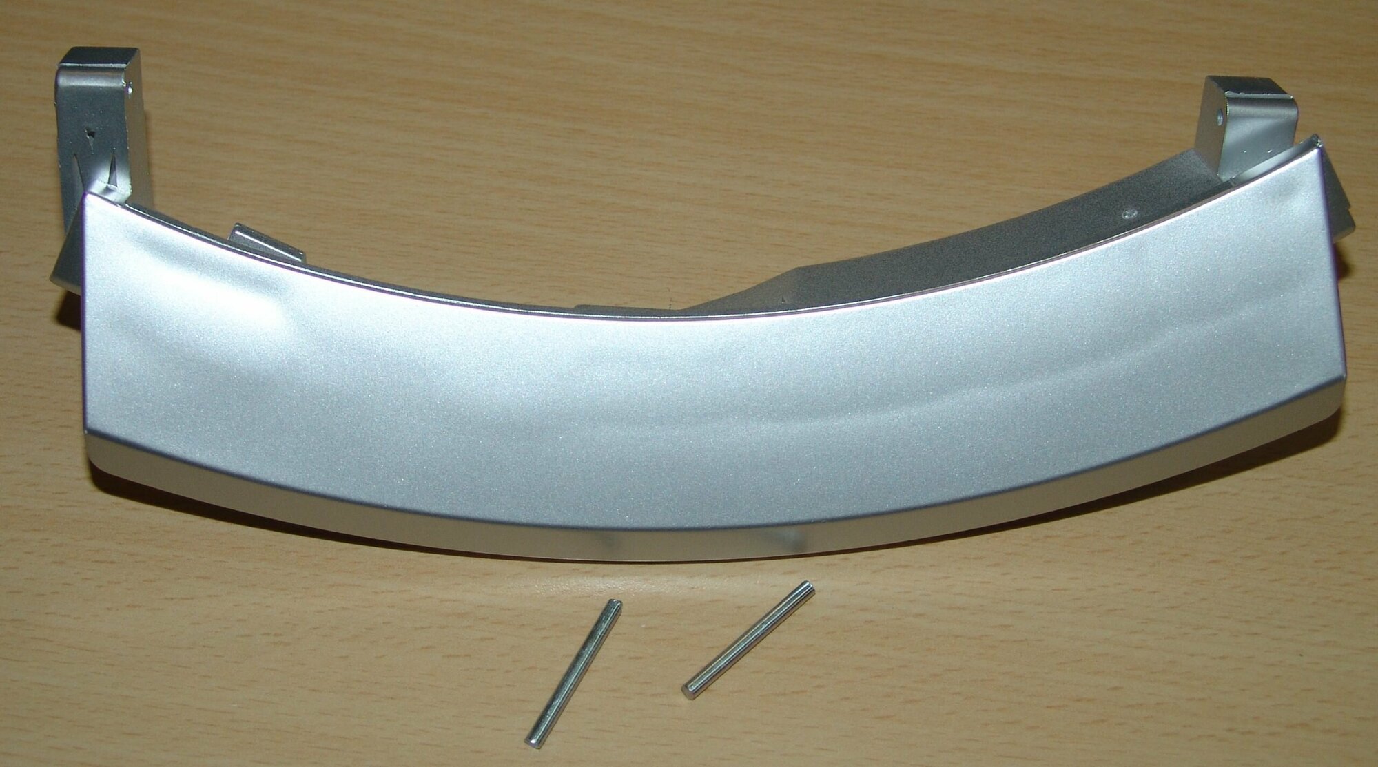 Ручка люка для стиральной машины Bosch (Бош) Siemens (Сименс) серебро KG0009451
